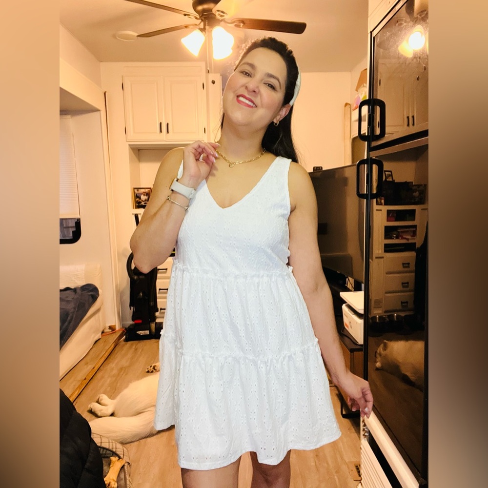 Cute dress, with braided detail on the back.